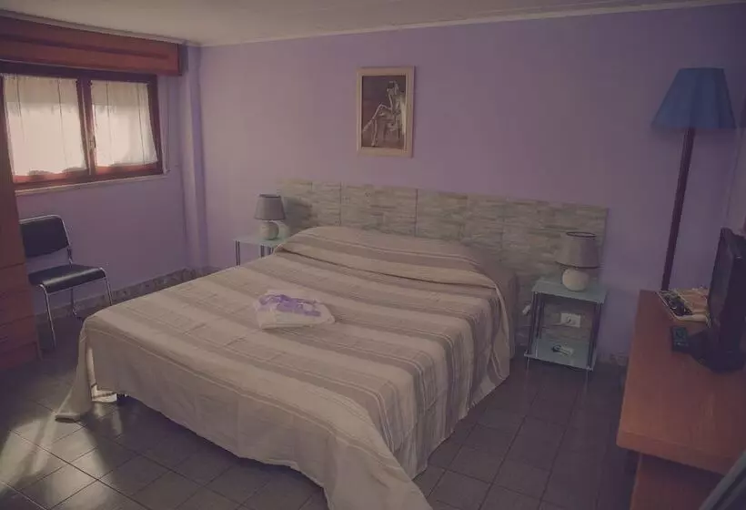 تختخواب و صبحانه Cassiodoro Rooms Affittacamere