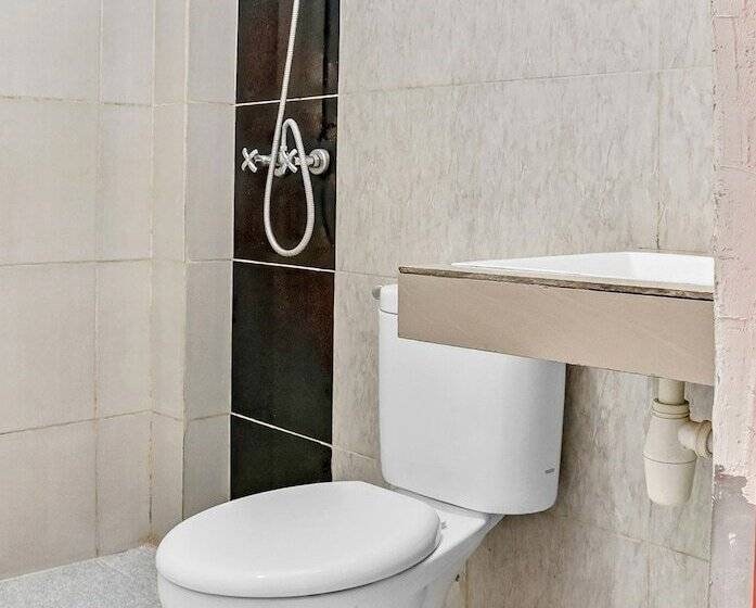 Отель Oyo 3903 Sweethome Syariah Guesthouse