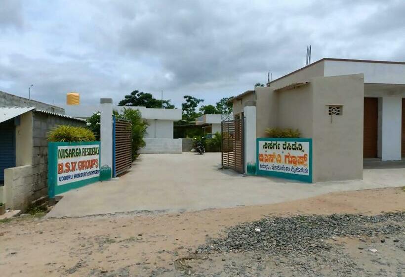 ホテル Spot On 90707 Nisarga Residency