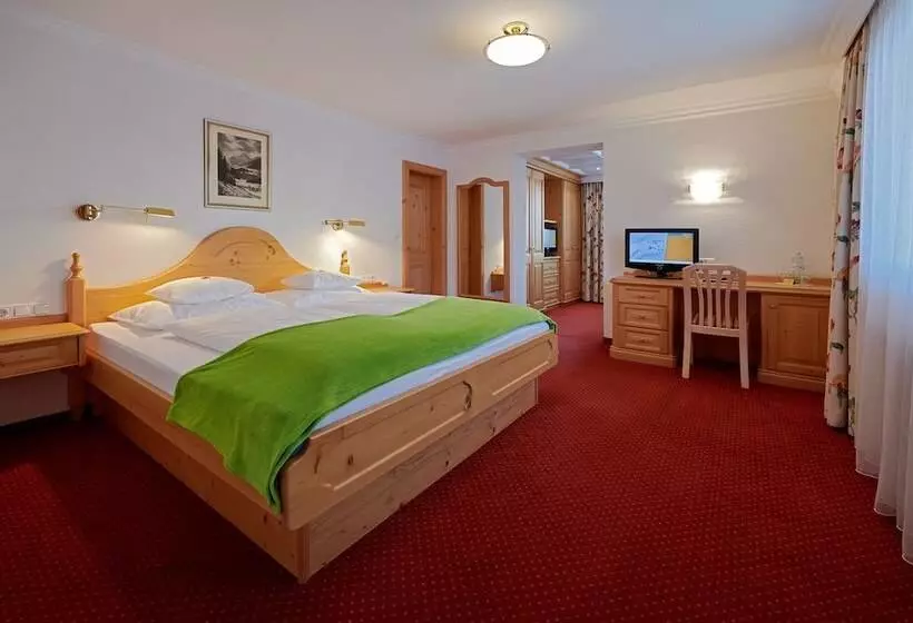 Отель Appartement Roggal