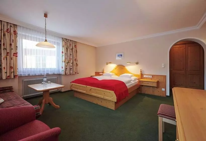 Отель Appartement Roggal