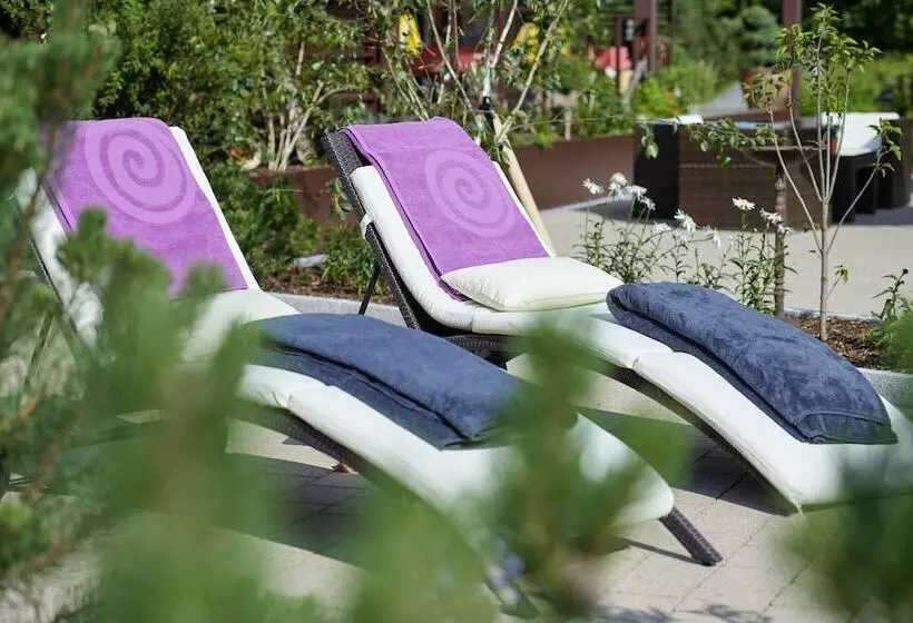 Отель Appartement Roggal