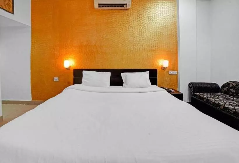 Capital O Convivial Hotel Amit Regency