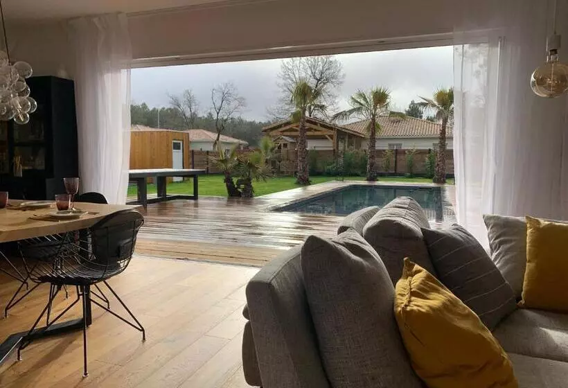 Villa Aux Palmiers,piscine 28°,pétanque,coeur Bassin