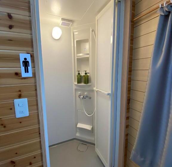 بنسيون ゲストハウス喜舎場