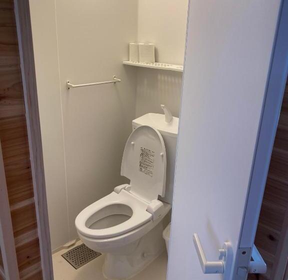 بنسيون ゲストハウス喜舎場