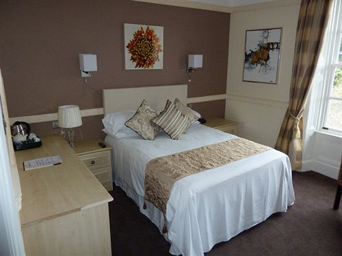 فندق The Queens , Q Bar & Bistro