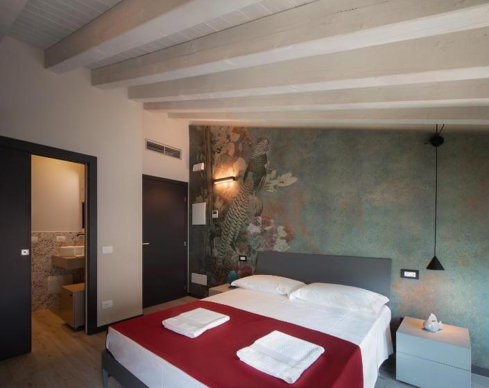 Общежитие Monte Isola   Decio Rooms