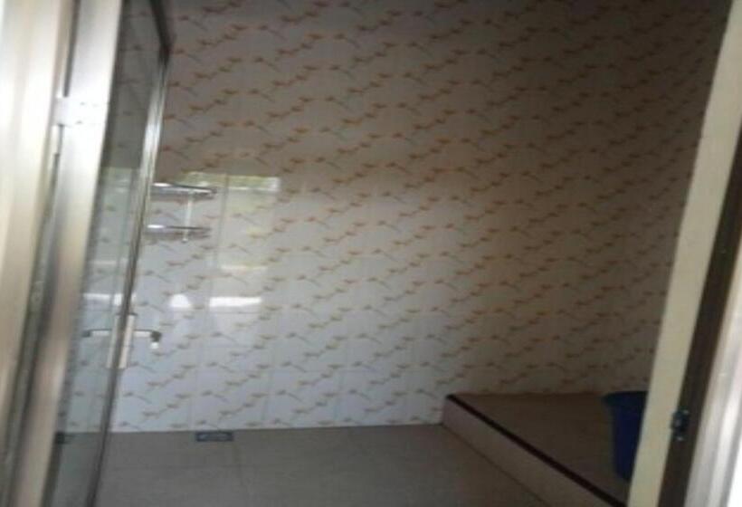 Hotel Express O 91708 Rumah Sriwijaya 12a Syariah