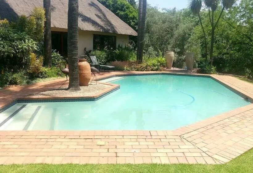 تختخواب و صبحانه Lourie Lodge