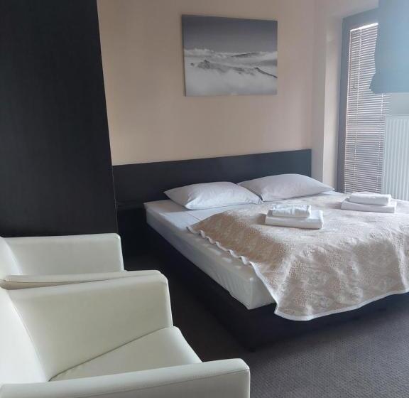 تختخواب و صبحانه Szara Willa