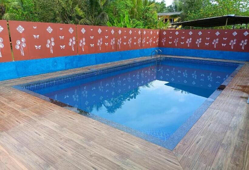 تختخواب و صبحانه Shree Vighnaharta Cottage