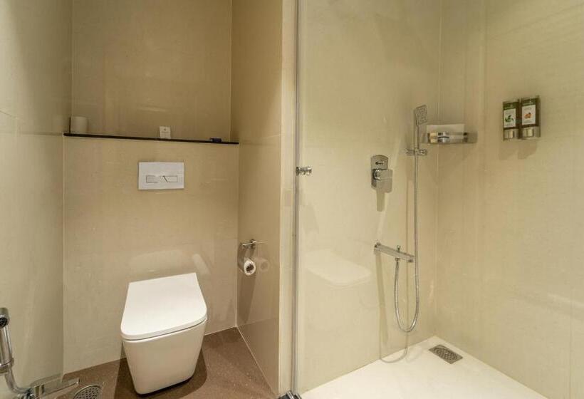 호텔 Shyama Sarovar Portico