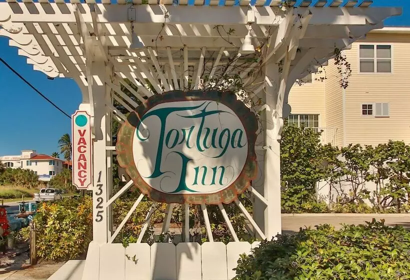 בית מלון כפרי Tortuga Inn Beach Resort