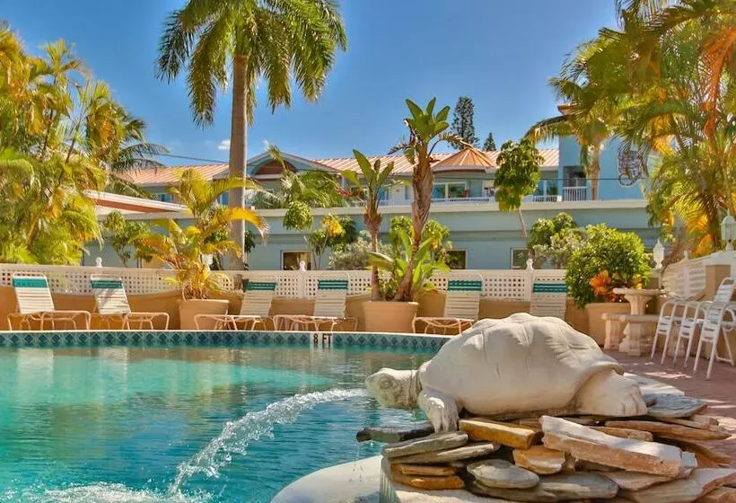 בית מלון כפרי Tortuga Inn Beach Resort