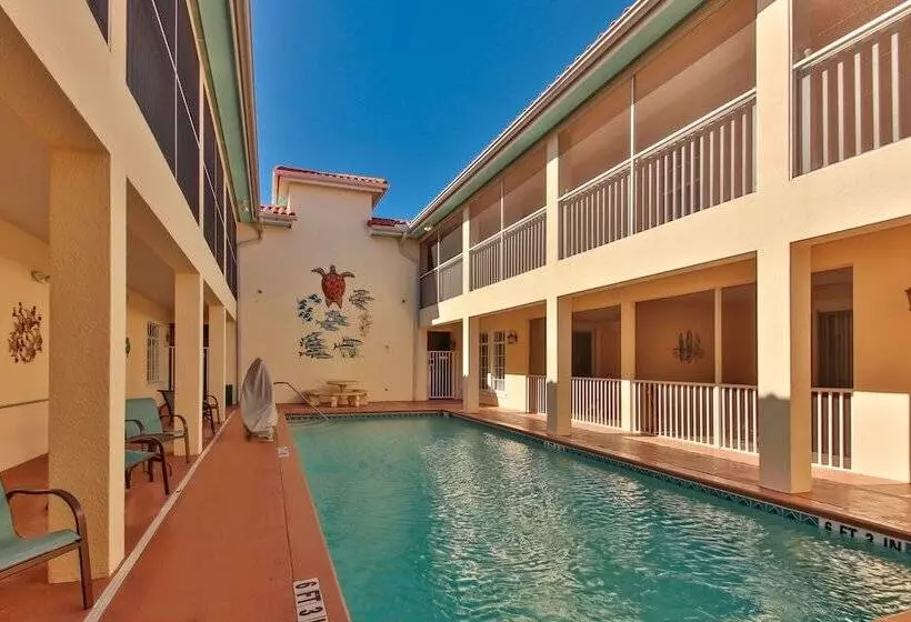 בית מלון כפרי Tortuga Inn Beach Resort