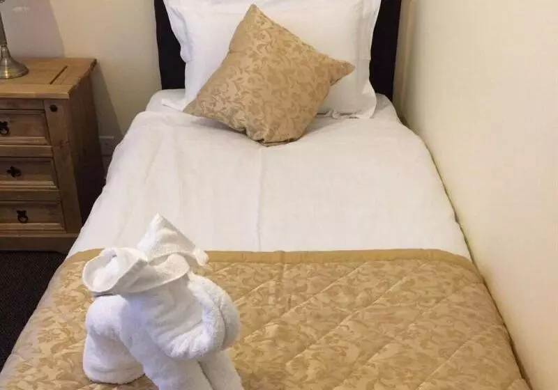 Pension (Hôtel basse catégorie) The Waverley Guest House