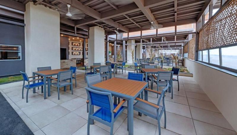 Отель The Fern Leo Beach Resort