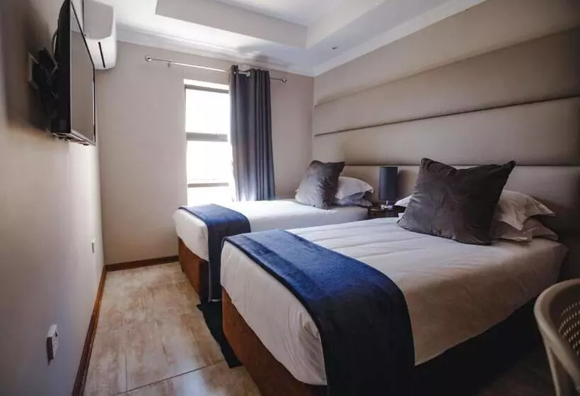 تختخواب و صبحانه The Capital Guest House