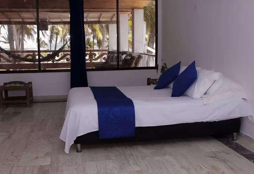 בית מלון כפרי Palmarito Beach