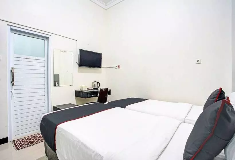 ホテル Capital O 92417 Sawahan Residence Syariah