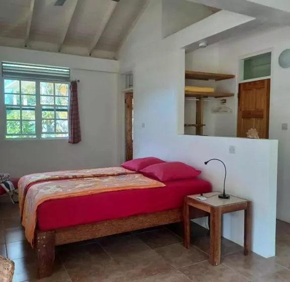 هتل Mango Garden Cottages