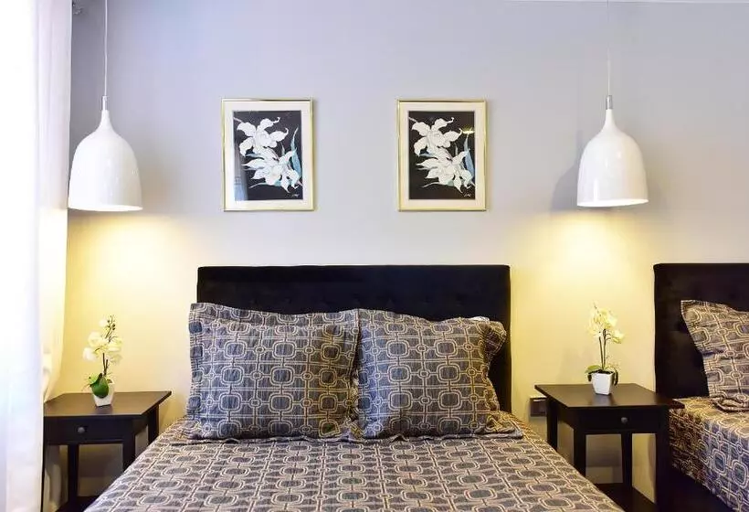 تختخواب و صبحانه Rusne Villa