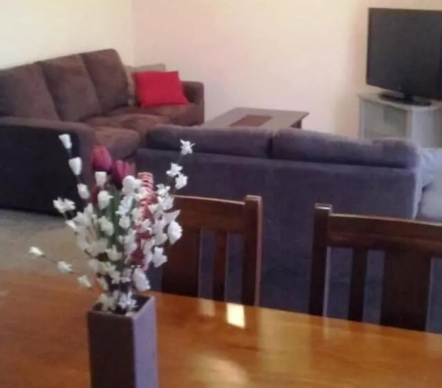 Отель Champelli Palms Apartments