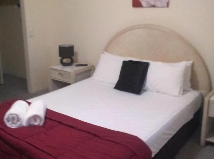 酒店 Champelli Palms Apartments