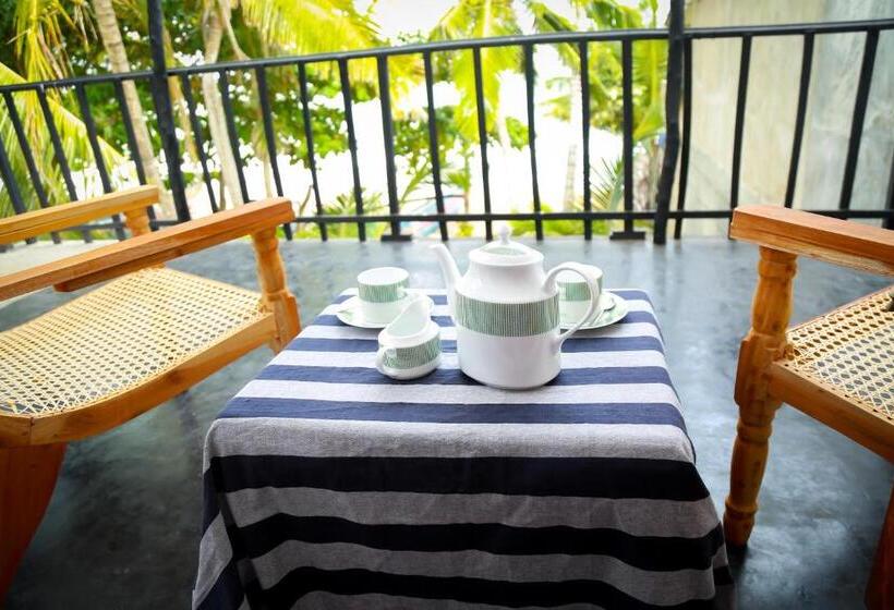 بنسيون Catamaran Beach Home And Restaurant