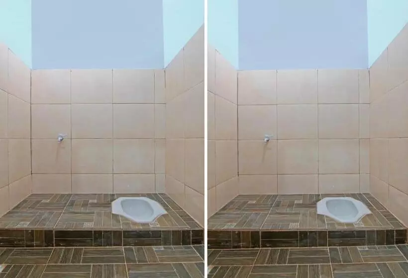 Hotelli Spot On 92570 Putri Guest House Syariah