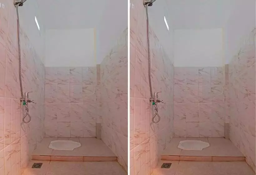 Hotelli Spot On 92570 Putri Guest House Syariah