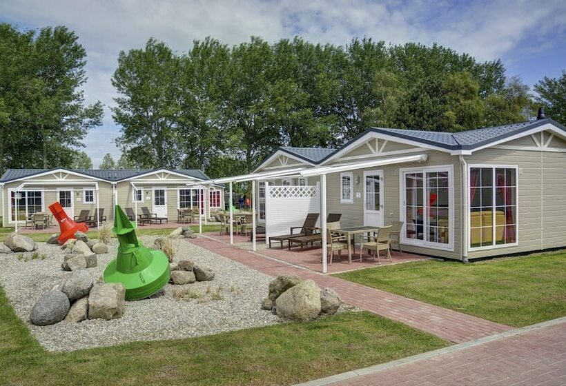 Отель Ferienwohnungen Wulfener Hals