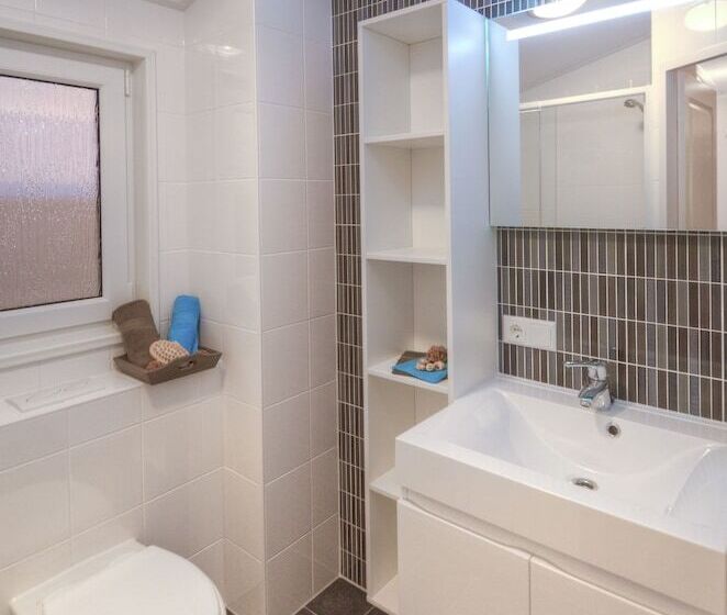 Отель Ferienwohnungen Wulfener Hals