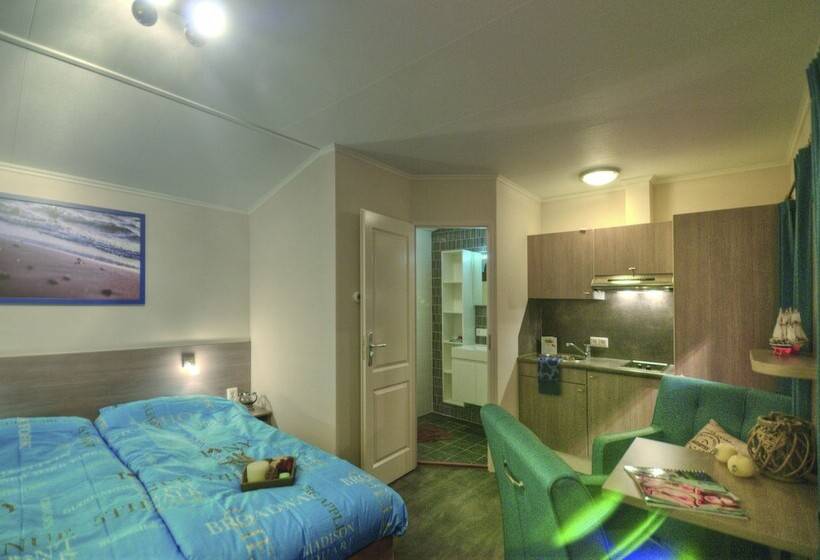 Отель Ferienwohnungen Wulfener Hals