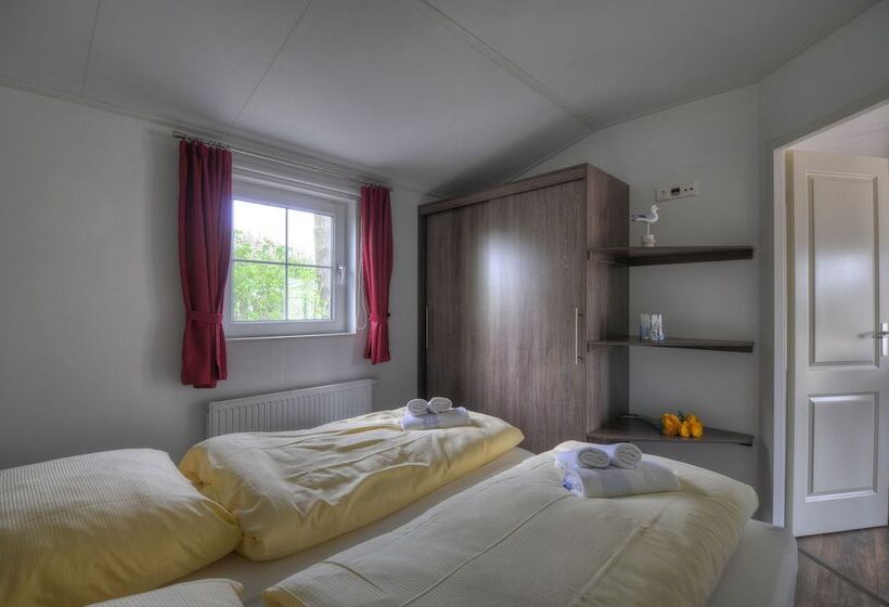 Отель Ferienwohnungen Wulfener Hals