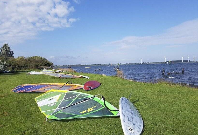 Отель Ferienwohnungen Wulfener Hals
