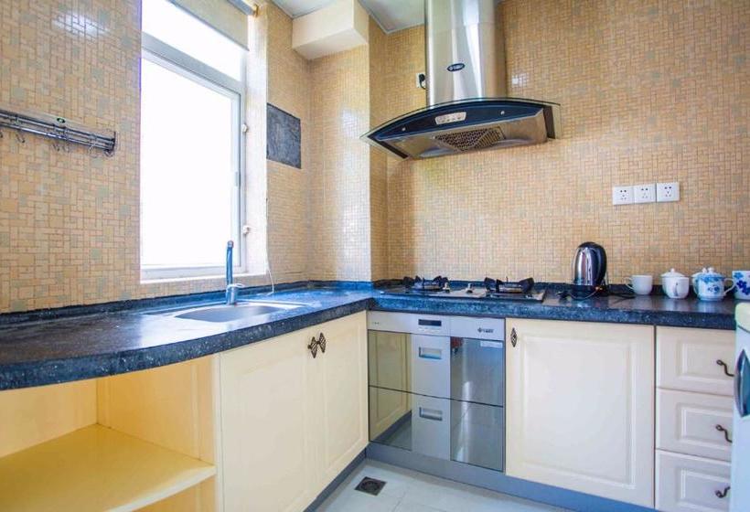 فندق Sanya Sunshine Holiday Apartment (yalong