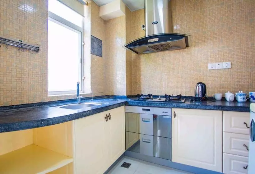 هتل Sanya Sunshine Holiday Apartment (yalong