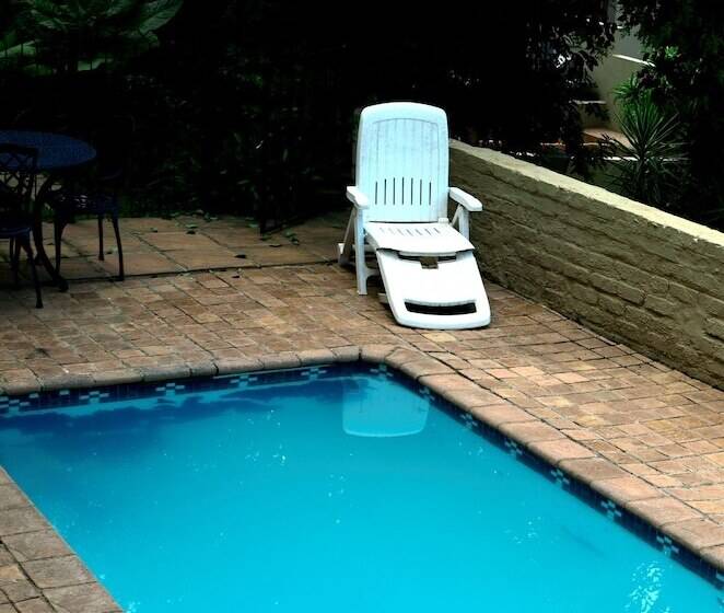 פנסיון 7th Street Guesthouse