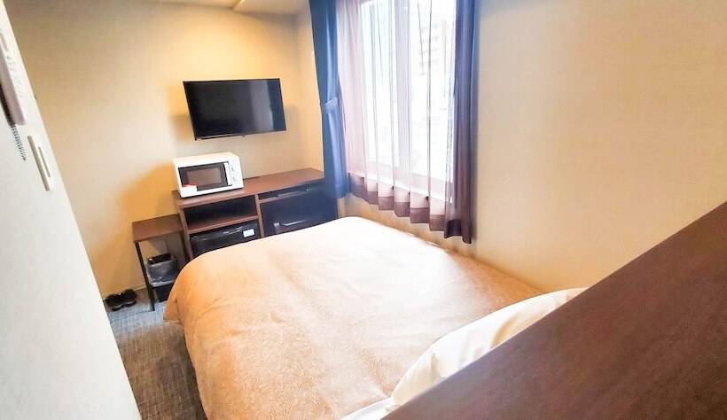 Отель Livemax Kamata Ekimae