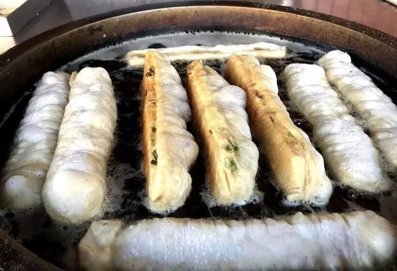 تختخواب و صبحانه Xin Xiang Shi Cheng