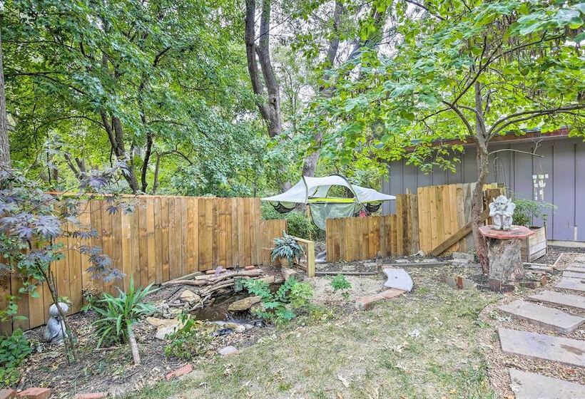 Overland Park Home W/ Deck & Waterfall Pond!