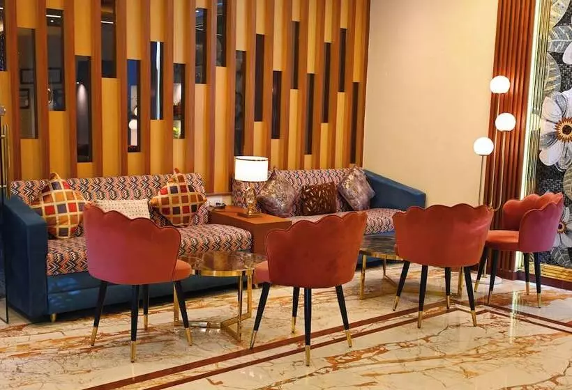 Hotelli Woods Inn Resort