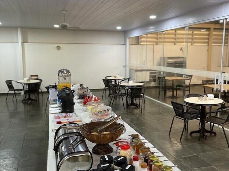 Отель Bravo Suites