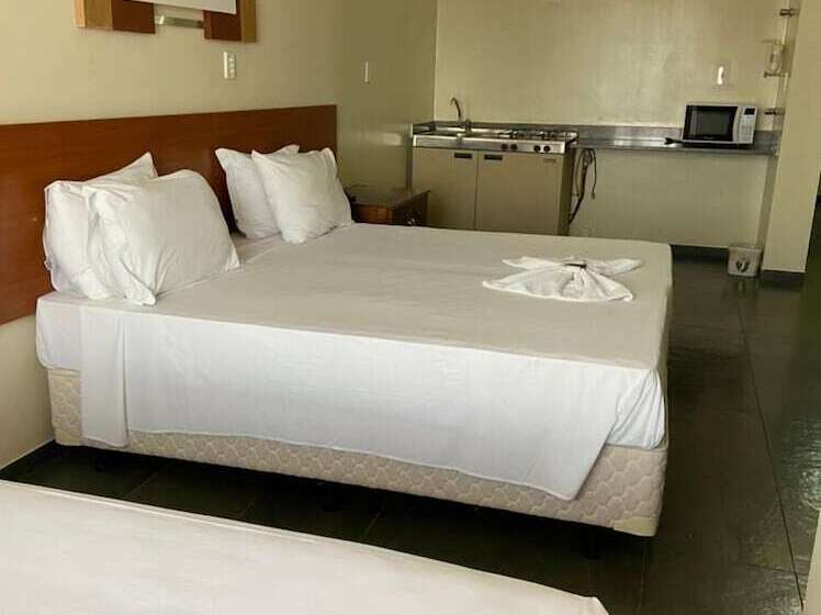 Отель Bravo Suites