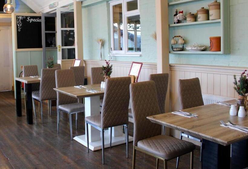 בית מלון כפרי Dog And Partridge Inn