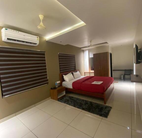 בית מלון כפרי Redbell Suites Kizhisseri