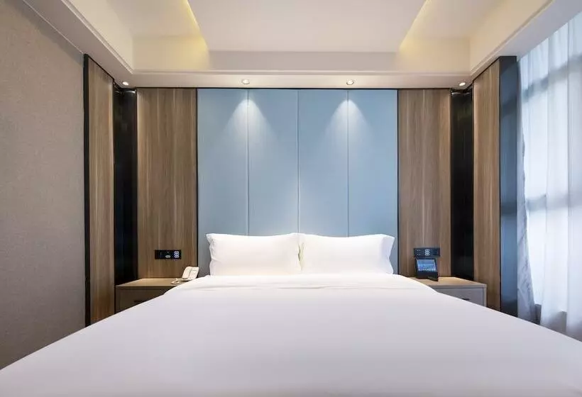 ホテル Kunyixingguangjiudian