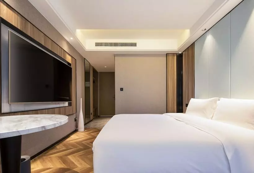 ホテル Kunyixingguangjiudian